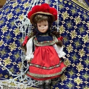 Porcelain doll. Festive outfit!